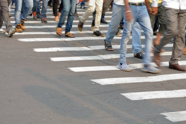 istock Pedestrians crossing road 826251830