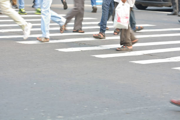 istock Pedestrians crossing road 826254770