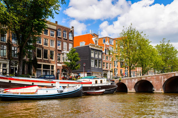 istock Typical bend houses in AMsterdam, Netherlands 826264642