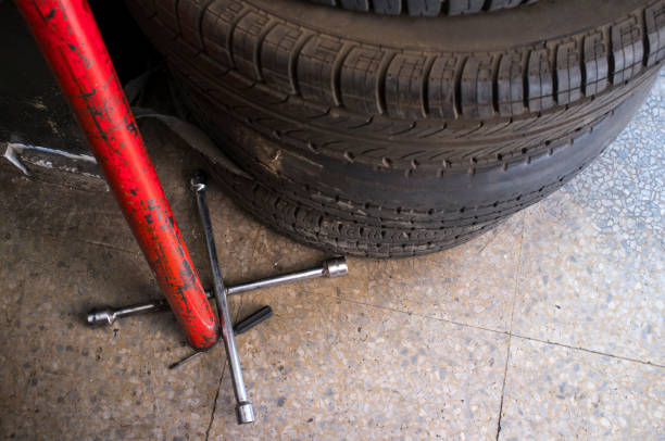 istock Used tyres with Fixed Cross Wheel Wrench 826272136