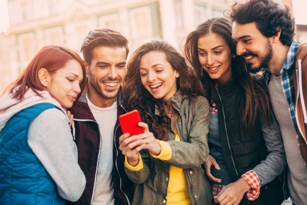 istock Friends texting in the city 826284450