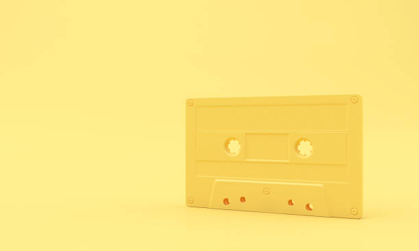 istock Yellow Cassette Tape on Yellow Background. 826285190