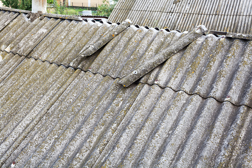 Asbestos old dangerous roof tiles
