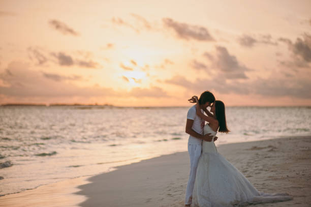 istock Wedding couple on the beach on the island 826288320