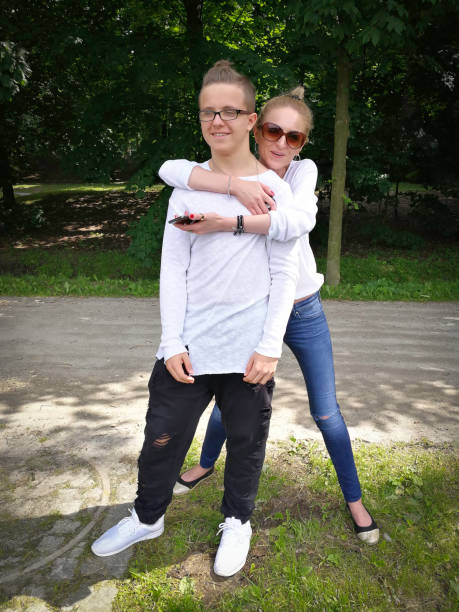 istock woman and young man on a walk 826288382