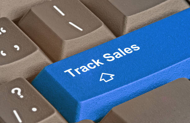 istock Keyboard with key to track sales 826288580