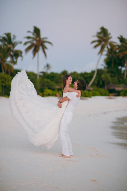 istock Wedding couple on the beach on the island 826288964