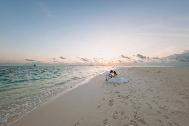 istock Wedding couple on the beach on the island 826288982