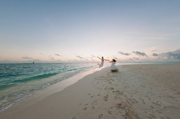 istock Wedding couple on the beach on the island 826289026