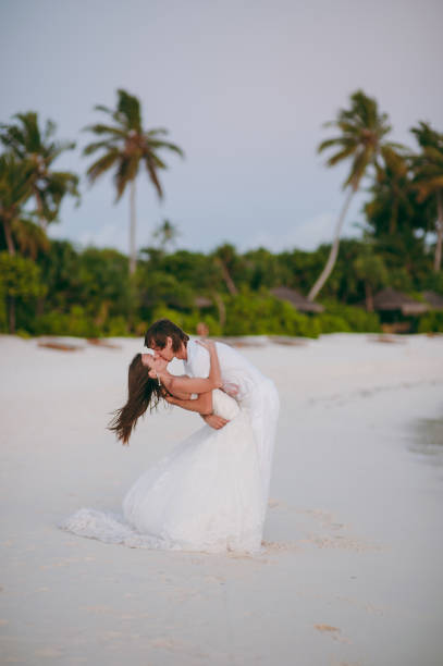 istock Wedding couple on the beach on the island 826289052