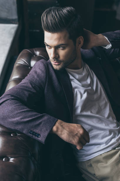 istock handsome man with fashionable hairstyle 826305254