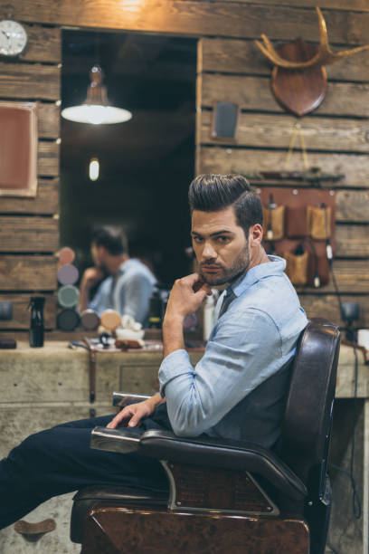 istock handsome man with fashionable hairstyle 826307728