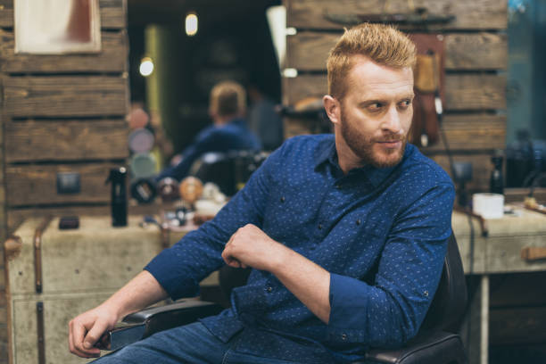 istock handsome man with fashionable hairstyle 826308378