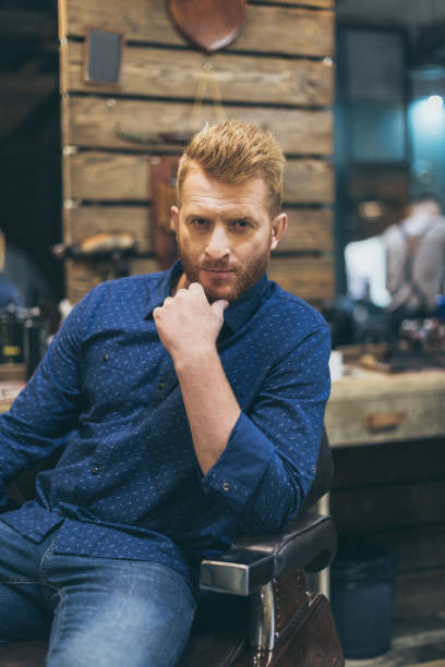 istock handsome man with fashionable hairstyle 826308874
