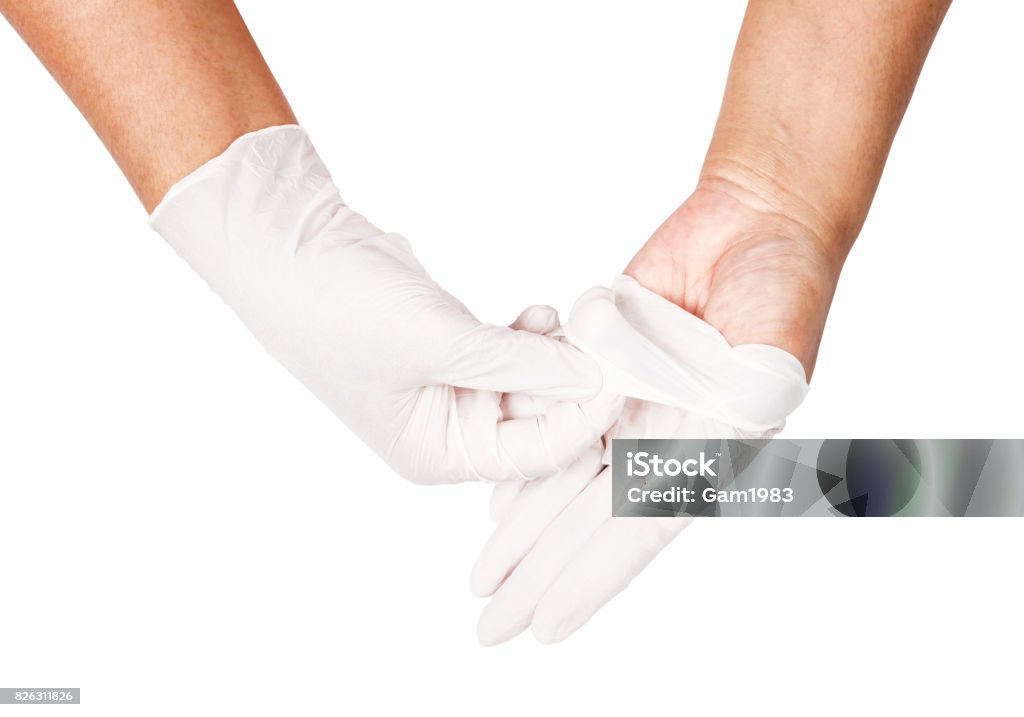 Hand throwing away white disposable gloves medical, Hand throwing away white disposable gloves medical, Isolated on white background, Save clipping path. Infection control concept. Alertness Stock Photo