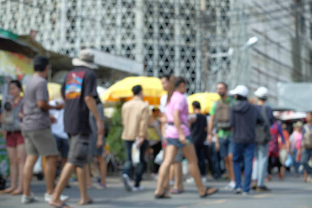 istock People walking in market 826320004