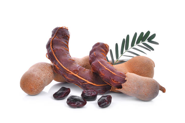 istock tamarind with leaf and seeds, tropical fruit isolated on white background 826323890