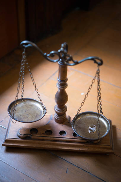 istock Decorative Scales of Justice With Diamond Ring 826323894