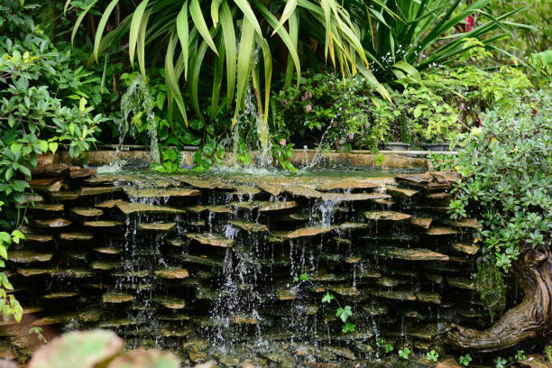 water falls garden - fountain indoors landscaped home interior imagens e fotografias de stock