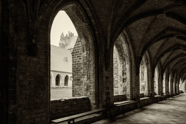 istock fantasy monastery archway with view to ocean an sunrays 826343504
