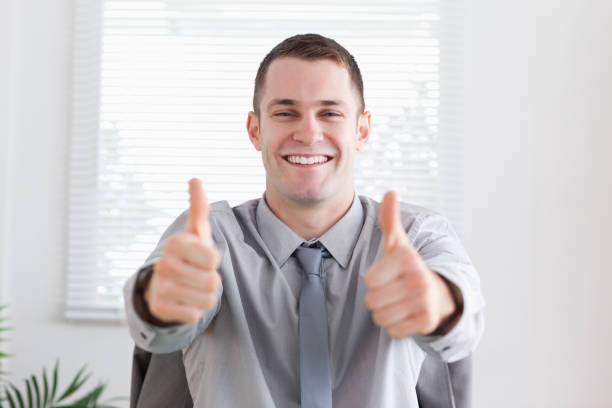 istock Businessman giving thumbs up 826344084