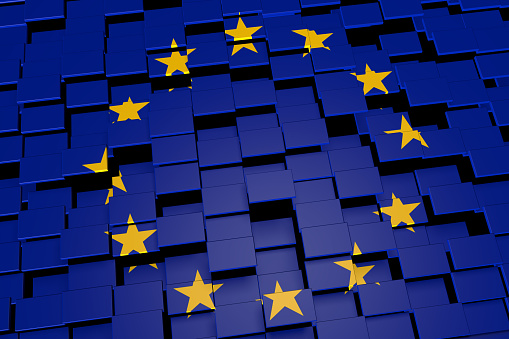 Modern 3D rendered concept of numerous square tiles sliding together to form the flag of the European Union.