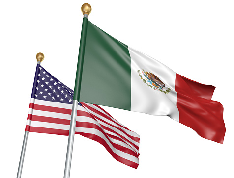 National flags from Mexico and the United States flying side by side to represent relations between the two countries, isolated on a white background.