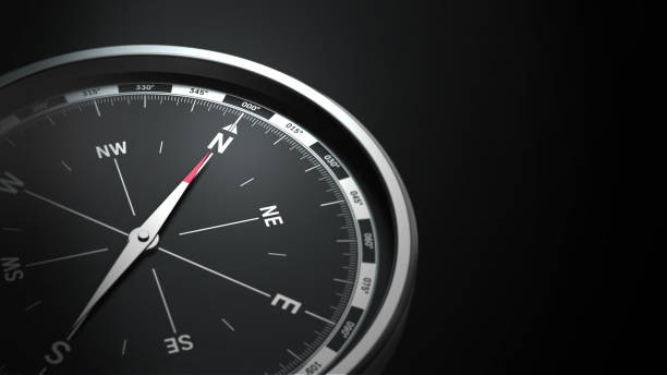 compass on black background compass on black background with copy space navigational compass photos stock pictures, royalty-free photos & images