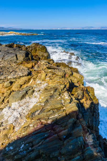 istock Waves crash over the rock in the Atlantic Ocean 826359328