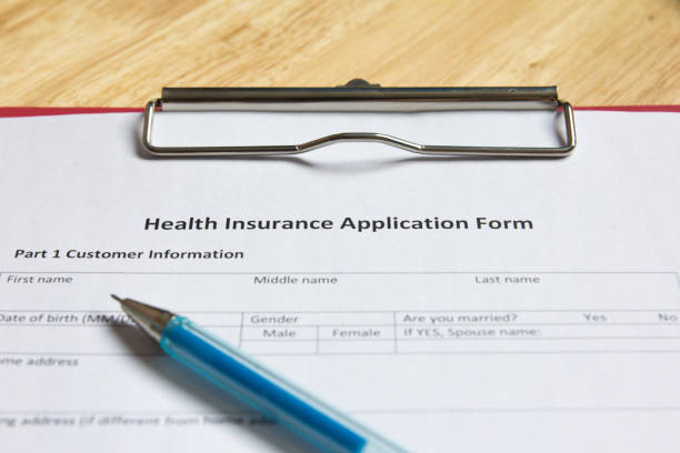 istock Health insurance form on file wait for filling background 826370096