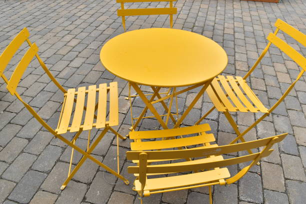 istock Yellow table and chairs for relaxation 826380786