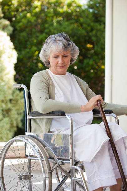 istock Senior woman in her wheelchair 826382004