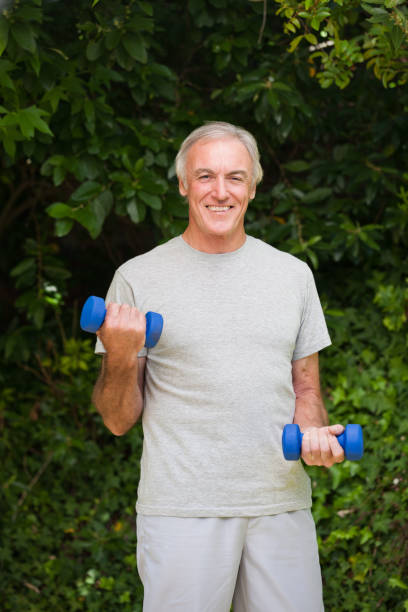 istock Senior man doing his exercises in the garden 826389062