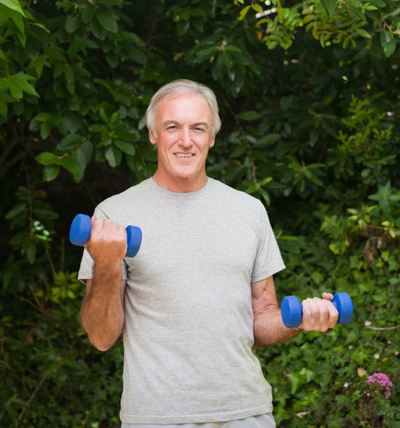 istock Senior man doing his exercises in the garden 826389208