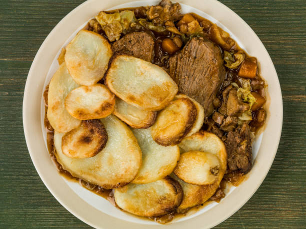 istock Lamb Hotpot With Sliced Potatoes and Onion Gravy 826393706