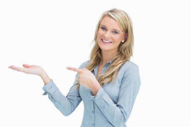istock Woman pointing at her hand 826409566