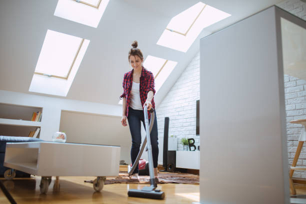 istock Smiling woman cleaning 826412396