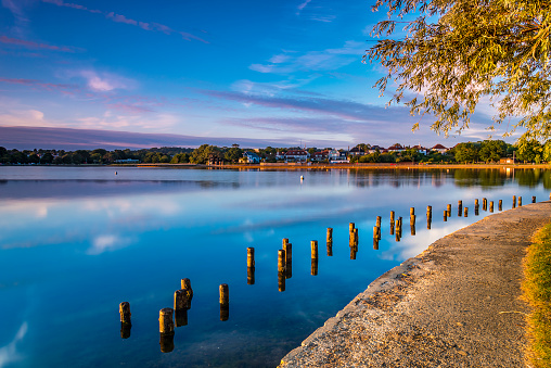 Boating lake in Poole Park on a clear calm evening