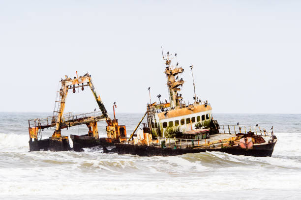 istock Damaged abandoned ship at the coastline of Namibia 826419446