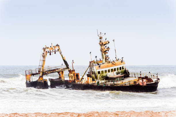 istock Damaged abandoned ship at the coastline of Namibia 826419464