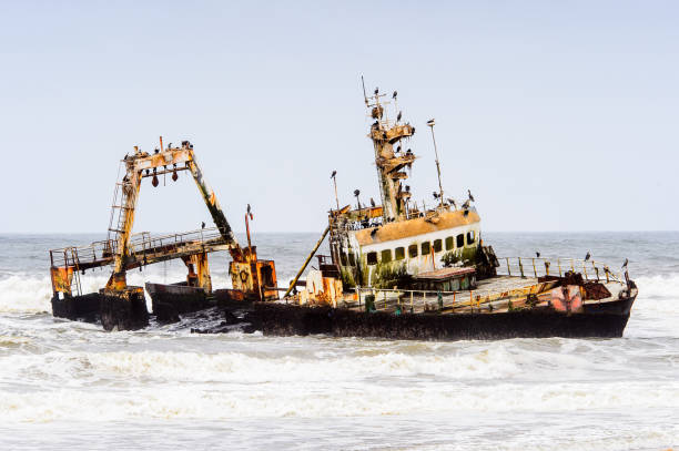 istock Damaged abandoned ship at the coastline of Namibia 826419482