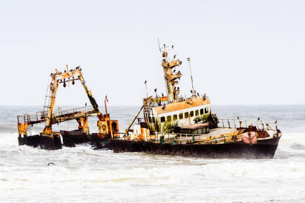 istock Damaged abandoned ship at the coastline of Namibia 826419486