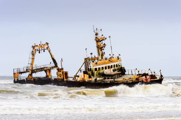 istock Damaged abandoned ship at the coastline of Namibia 826419498