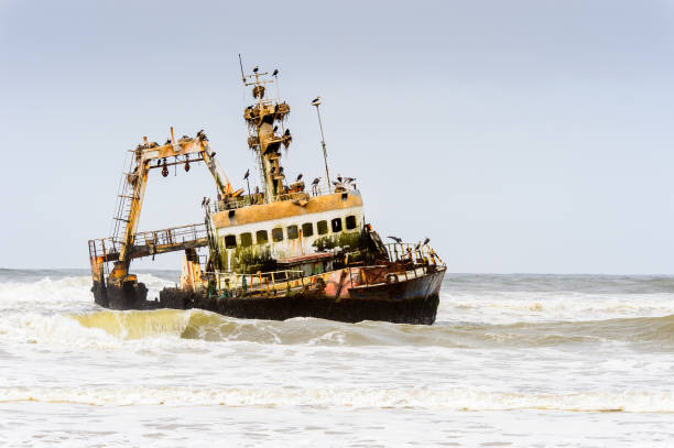 istock Damaged abandoned ship at the coastline of Namibia 826419510