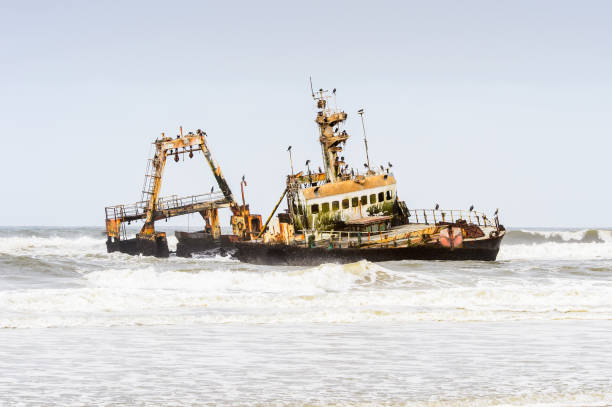 istock Damaged abandoned ship at the coastline of Namibia 826419516