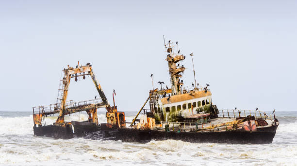 istock Damaged abandoned ship at the coastline of Namibia 826419526