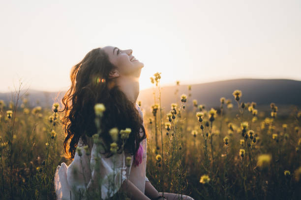 istock Cute hipster woman in burdock field 826420374