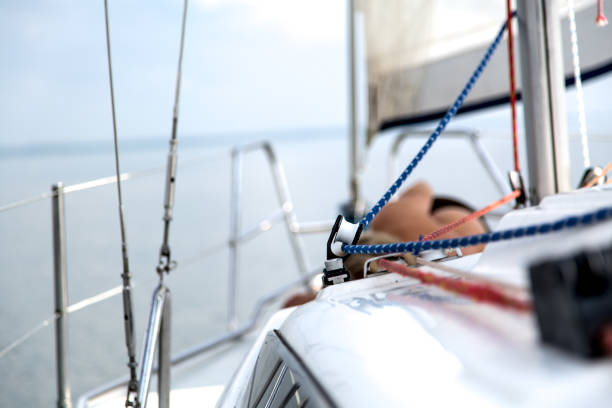 istock Sailing on white sail boat in Polish lake district 826420414
