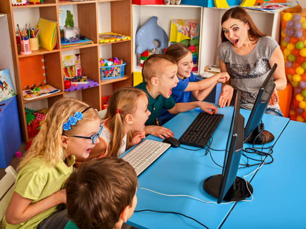 Children computer class us for education and video game. stock photo