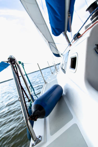 istock Sailing on white sail boat in Polish lake district 826432792